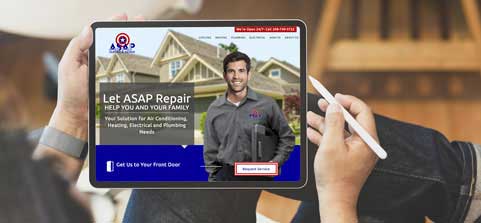 man with tablet in lap